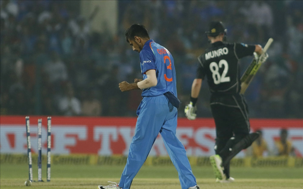 Yuzvendra Chahal of India celebrates fall of Colin Munro`s wicket during the third ODI match between India and New Zealand at Green Park Stadium in Kanpur. Yuzvendra Chahal of India celebrates fall of Colin Munro`s wicket during the third ODI match between India and New Zealand at Green Park Stadium in Kanpur.