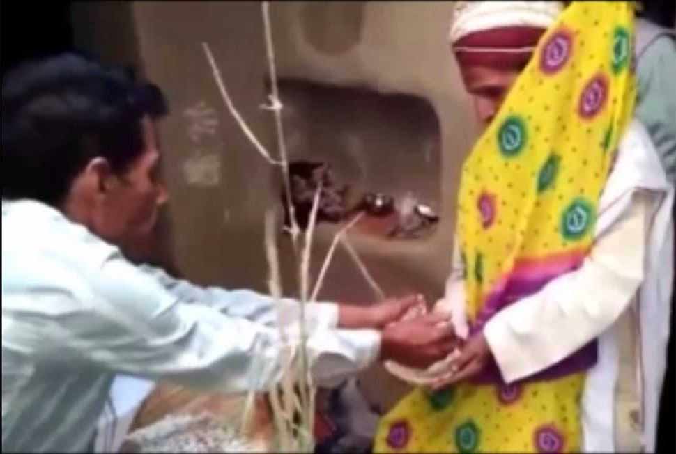 Man marry with wooden bride