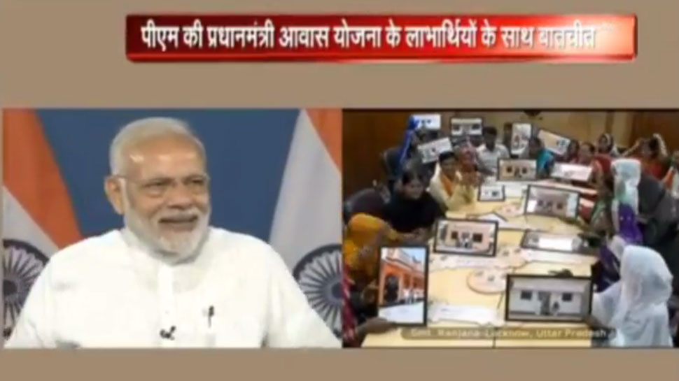 PM Narendra Modi interacts with Pradhan Mantri Awas Yojana beneficiaries across the nation.
