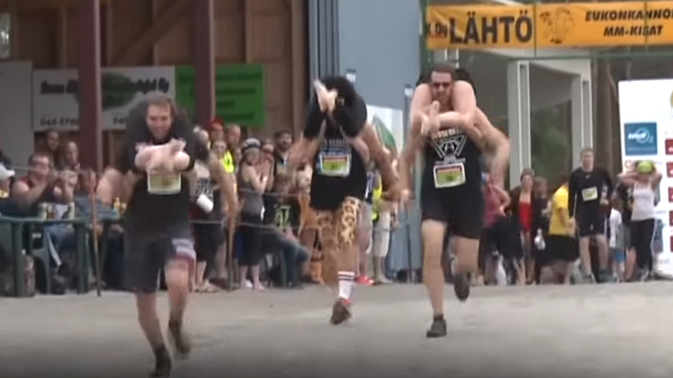 Lithuanian couple won wife-carrying championship in finland? ????? ... image