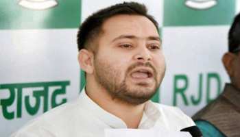 आरजेडी के पोस्टर पर तेजस्वी यादव ने जताई आपत्ति, कहा- 'मैं समर्थन नहीं करता' आरजेडी के पोस्टर पर तेजस्वी यादव ने जताई आपत्ति, कहा- 'मैं समर्थन नहीं करता'