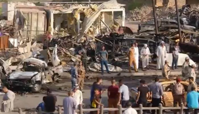 बाजार में हुए आत्मघाती हमले में 115 लोगों की मौत के बाद इराक में गुस्सा बाजार में हुए आत्मघाती हमले में 115 लोगों की मौत के बाद इराक में गुस्सा