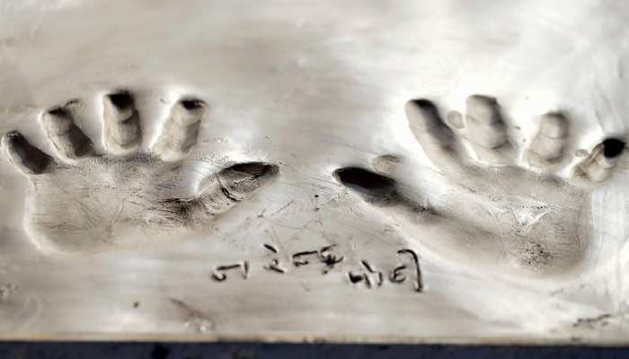 hand prints of PM Modi are imprinted on wet clay during the BRICS Summit hand prints of PM Modi are imprinted on wet clay during the BRICS Summit