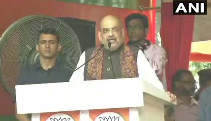 शाह ने NRC मुद्दे पर ममता और राहुल पर साधा निशाना, TMC सरकार को उखाड़ फेंकने का किया आह्वान शाह ने NRC मुद्दे पर ममता और राहुल पर साधा निशाना, TMC सरकार को उखाड़ फेंकने का किया आह्वान