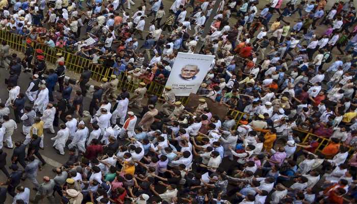 public participate in the last journey of former prime minister Atal Bihari Vajpayee as his mortal remains are taken for cremation to Smriti Sthal, in New Delhi public participate in the last journey of former prime minister Atal Bihari Vajpayee as his mortal remains are taken for cremation to Smriti Sthal, in New Delhi