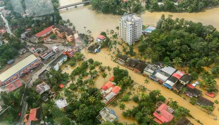 Kerala flood : People living in church cemetery with their domestic animals Kerala flood : People living in church cemetery with their domestic animals