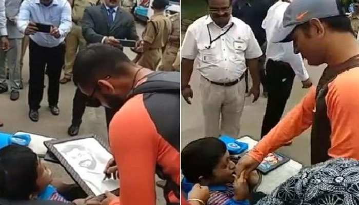 VIDEO: 'स्पेशल' फैन से मिले धोनी-विराट, कुछ यूं जीत लिया दिल VIDEO: 'स्पेशल' फैन से मिले धोनी-विराट, कुछ यूं जीत लिया दिल