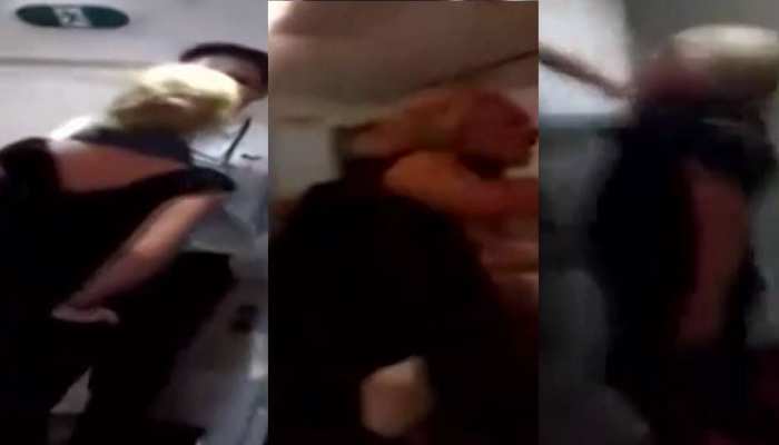 VIDEO: नशे में धुत विदेशी महिला यात्री का एयर इंडिया फ्लाइट में हंगामा, क्रू मेंबर को जड़ा थप्पड़ VIDEO: नशे में धुत विदेशी महिला यात्री का एयर इंडिया फ्लाइट में हंगामा, क्रू मेंबर को जड़ा थप्पड़