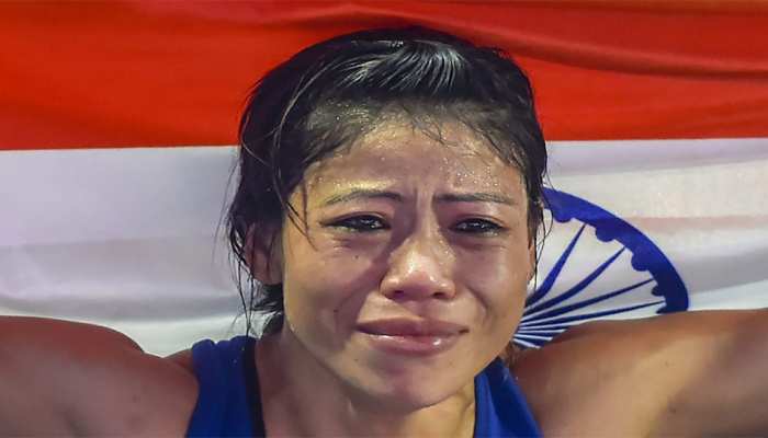 Indian boxer Mary Kom gets emotional as she celebrates after winning the final match of women's light flyweight against Ukraine's Hanna Okhota Indian boxer Mary Kom gets emotional as she celebrates after winning the final match of women's light flyweight against Ukraine's Hanna Okhota