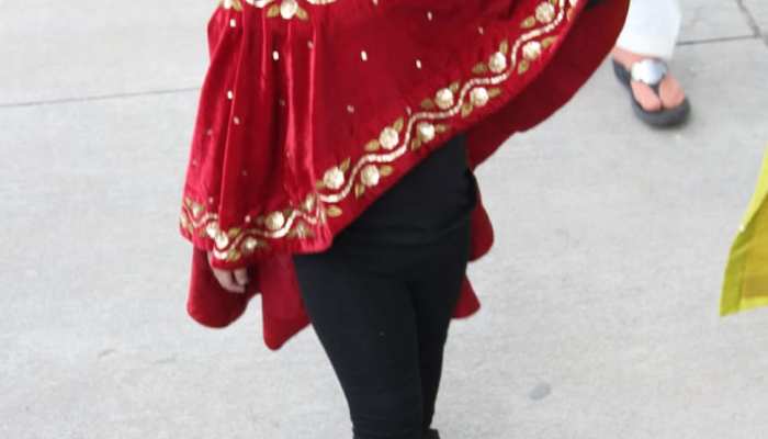 Ziva Dhoni looks super cute in red cape on her way back from Isha Ambani's sangeet Ziva Dhoni looks super cute in red cape on her way back from Isha Ambani's sangeet